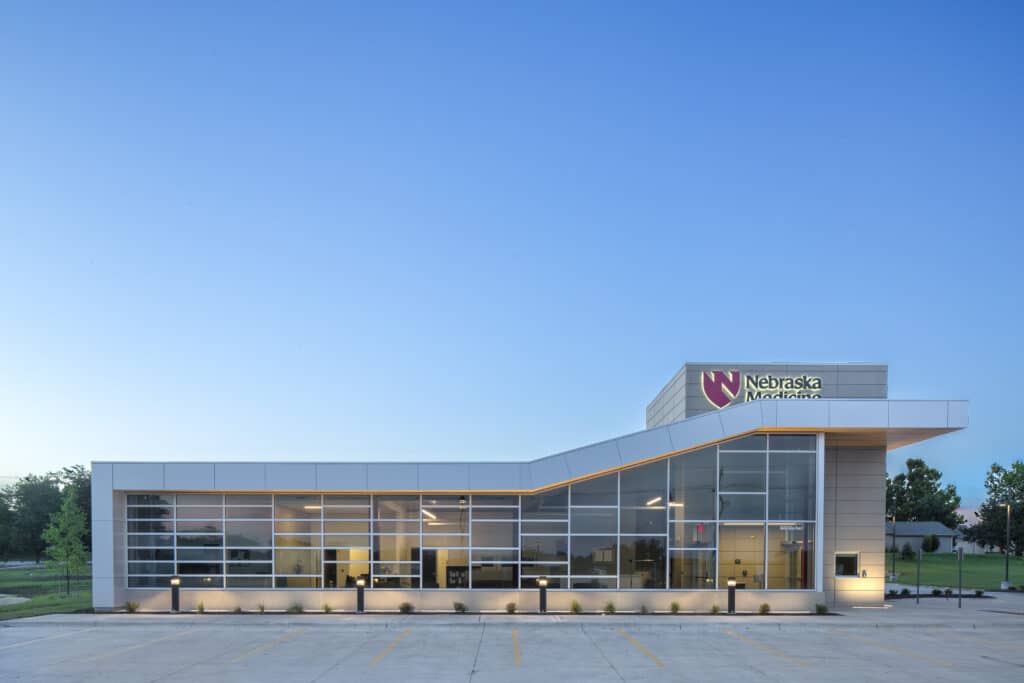 Nebraska Medicine clinic, lit at dusk