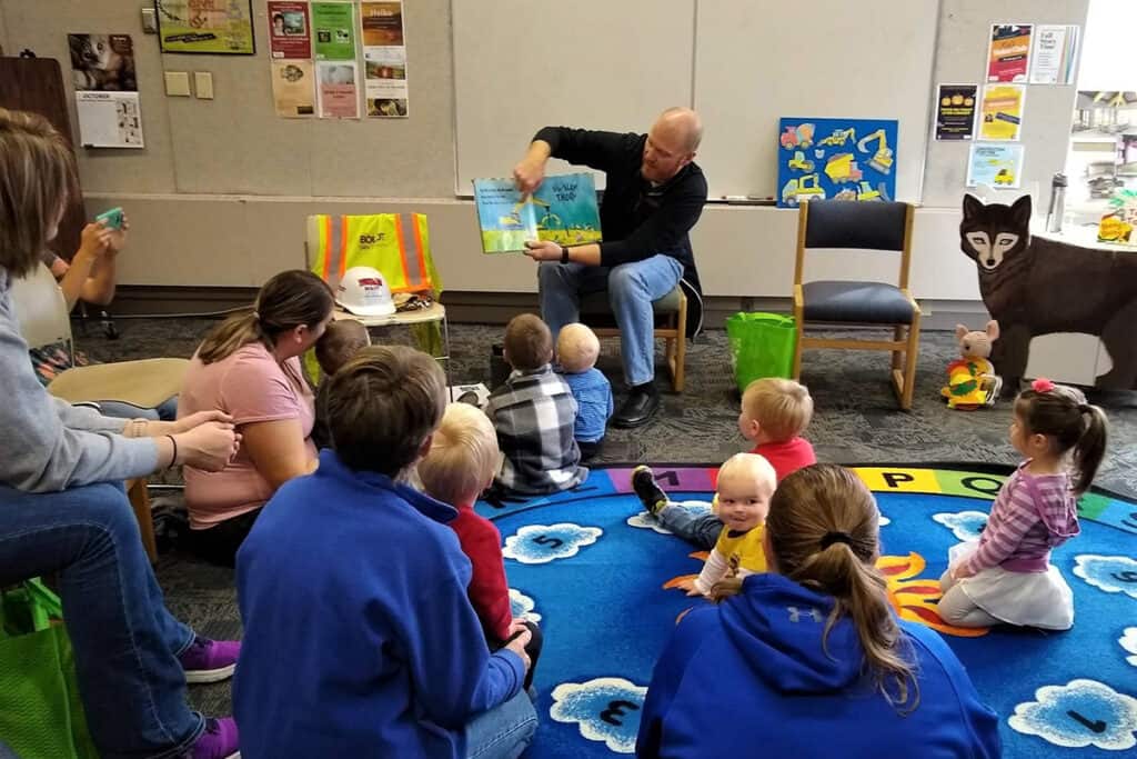 Boldt employees read for story time at the Cloquet Public Library