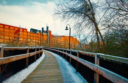 Pedestrian Walkway over the Chippewa River in Eau Claire, Wisconsin, with Banbury Place in the Background