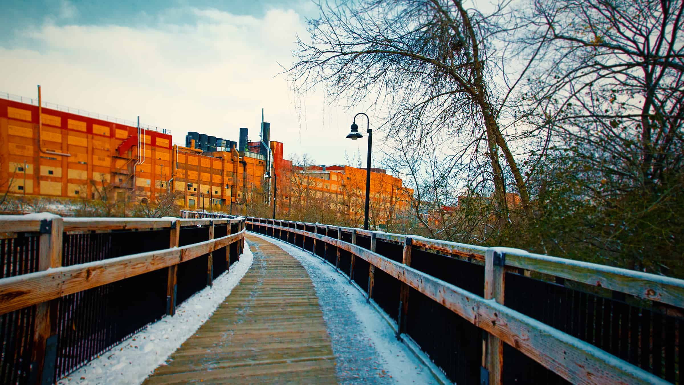Pedestrian Walkway over the Chippewa River in Eau Claire, Wisconsin, with Banbury Place in the Background