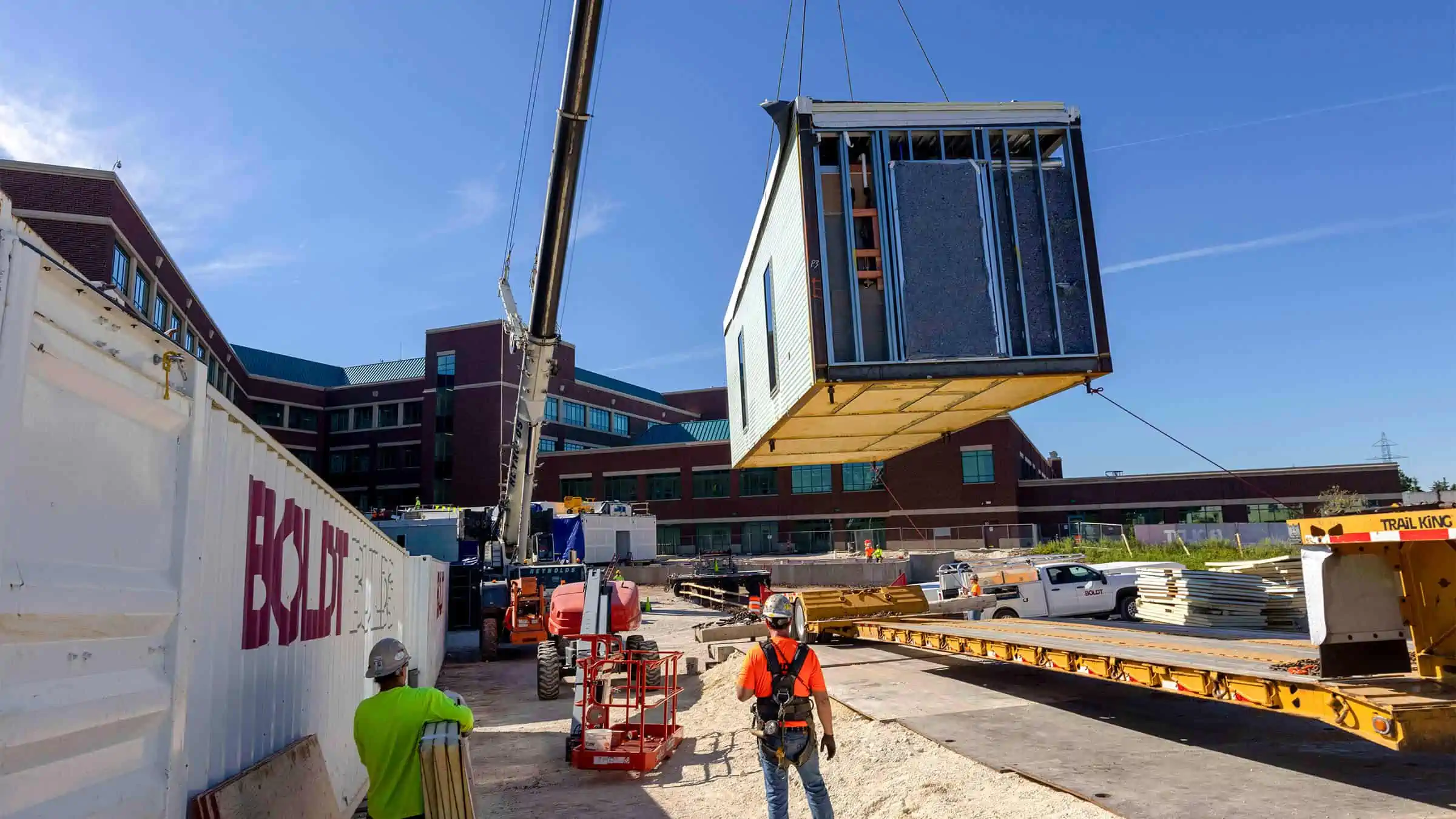 Modular unit being lifted into place by a crane at the Aurora Grafton construction site