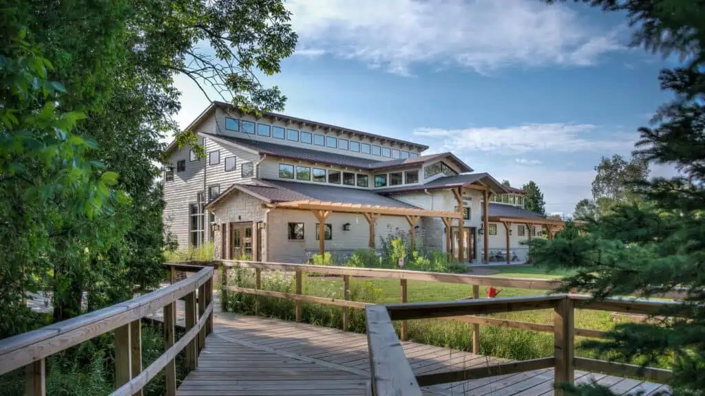 wooden walk way to nature center building