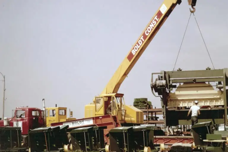 Crane lifting heavy machinery