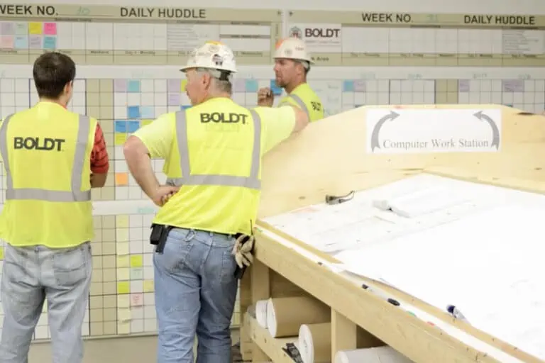 3 Boldt employees at planning wall