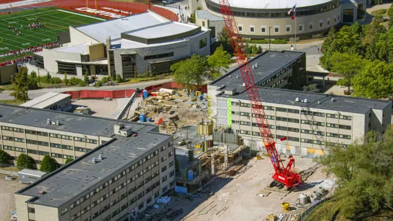Boldt crane working on an educational campus between buildings