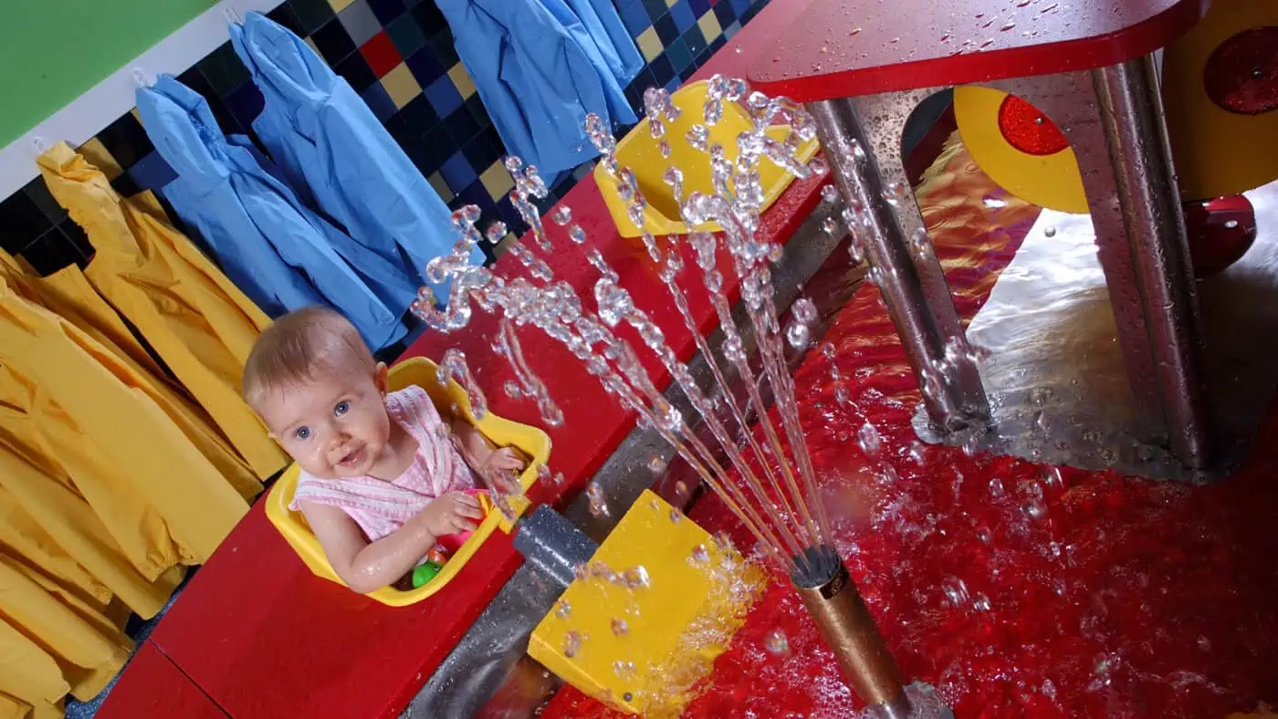 Appleton Building for Kids - Play Area with Water and Young Child