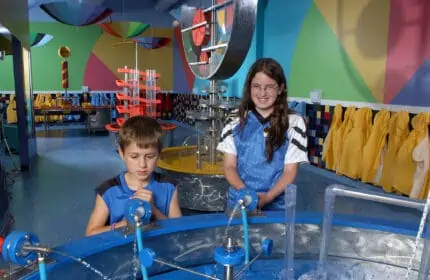 Appleton Building for Kids - Two Children Play with Water Area