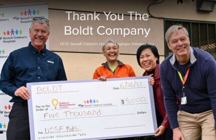 Boldt San Francisco employees present oversized check to UCSF Benioff Children's Hospitals - Children's Miracle Network