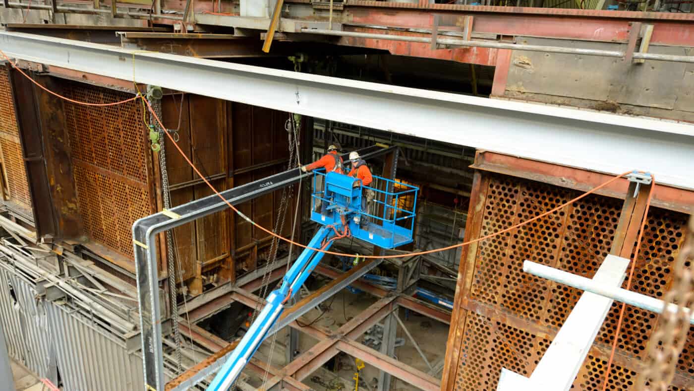 Consumers Energy - JH Campbells Generating Plant Unit 3 Two Workers in Lift Outside Building