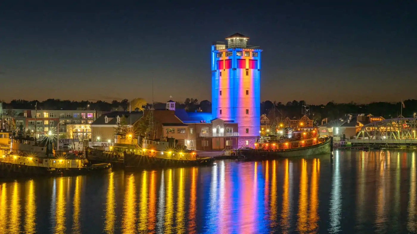 Door County Maritime Museum - Jim Kress Tower Lit at Night with Reflection on Water