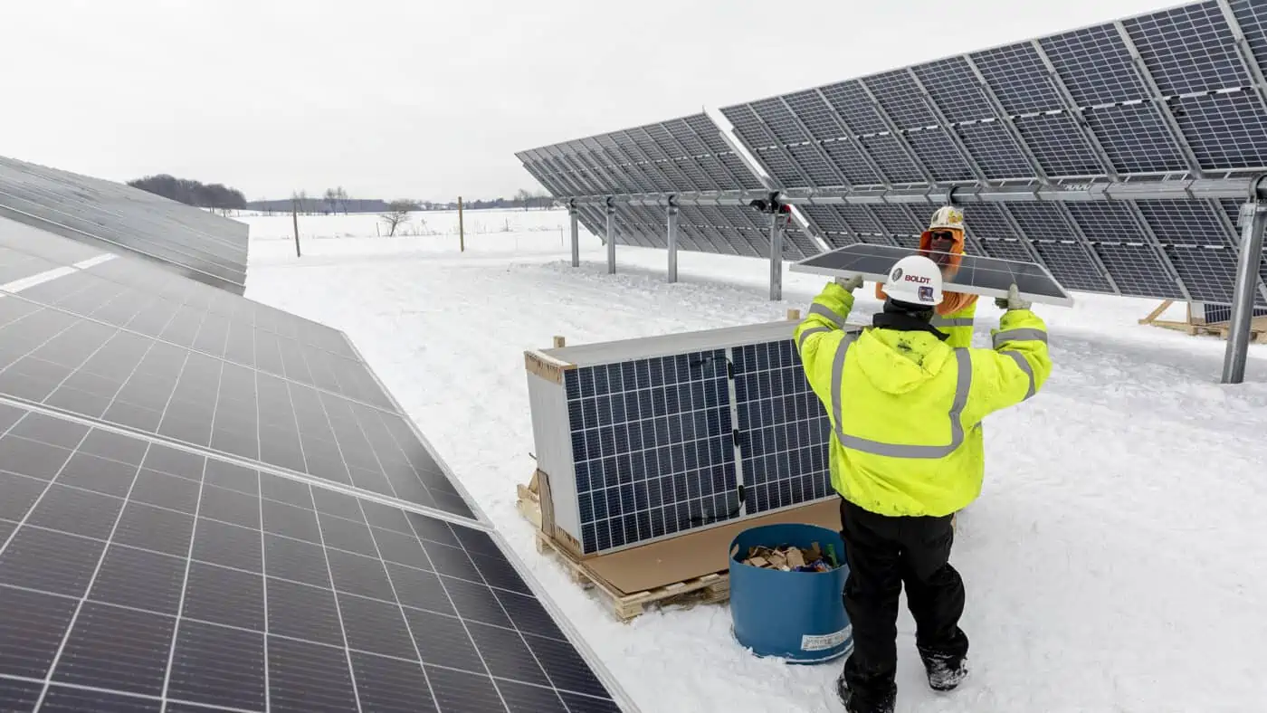 EDF Renewables - O'Brien Solar Farm View of Panel Installation by Two Workers