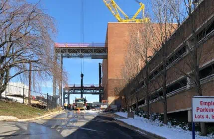 Johns Hopkins Sibley Memorial Hospital - Proton Therapy Equipment Installation - Equipment Hoist Exterior from Driveway