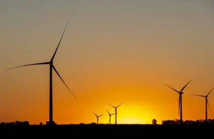 Lone Tree Wind Farm Construction Project Field of Turbines at Sunset