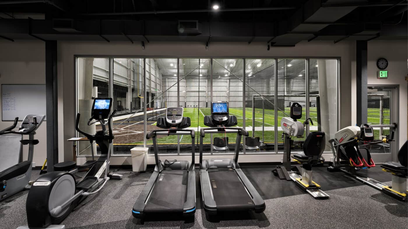Midwest Orthopedic Specialty Hospital (MOSH) - Performance Center Interior Fitness Center with Sports Field View