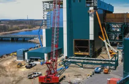Minnesota Power - Boswell Energy Center Aerial View, Unit 4 Construction of Metal Clad Building Exterior with Crane and Lifts