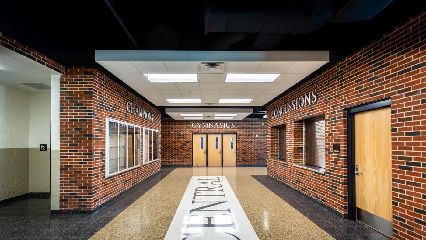 Moore Public Schools - Central Jr. High School Gymnasium Lobby with Concessions, Trophy Case and Gymnasium Entrance