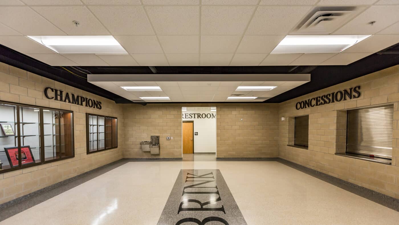 Moore Public Schools - Highland West Jr. High School Gymnasium Concessions and Trophy Case