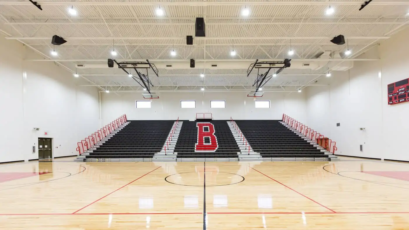 Moore Public Schools - Highland West Jr. High School Gymnasium Basketball Court and Bleachers