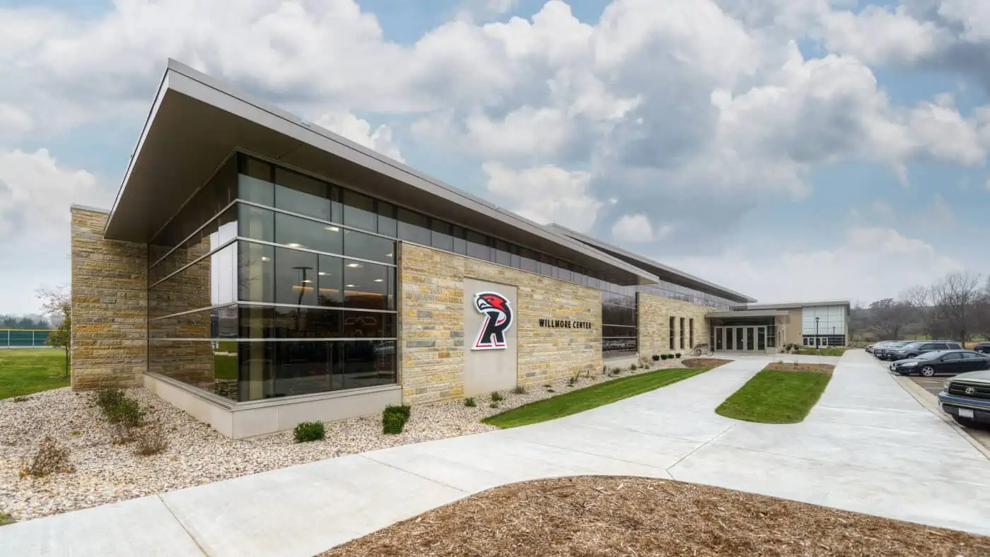 Ripon College - Athletic & Wellness Center Exterior of Stone and Glass with Sidewalks and Parking