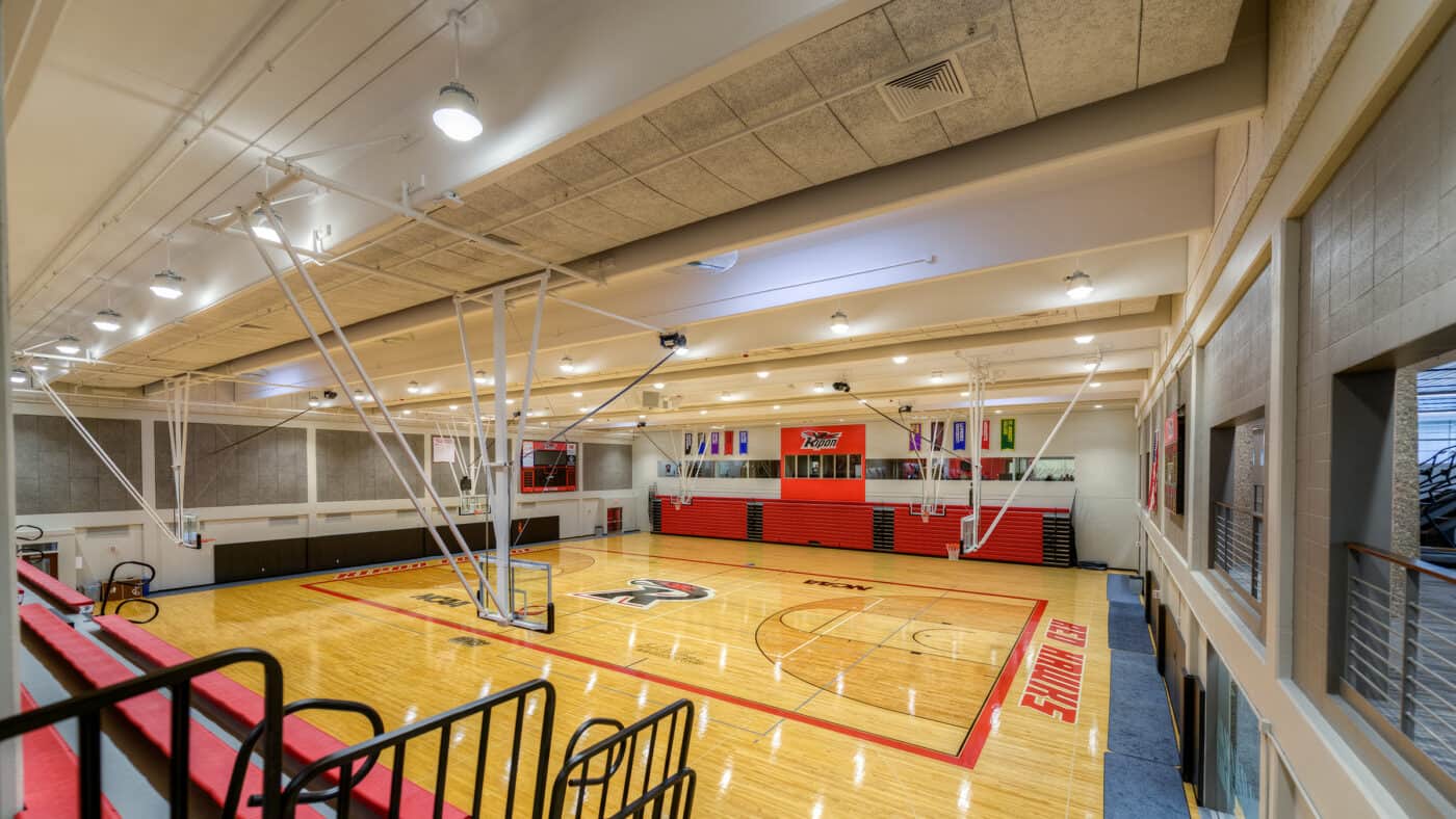 Ripon College - Athletic & Wellness Center Basketball Court with Bleacher Seating