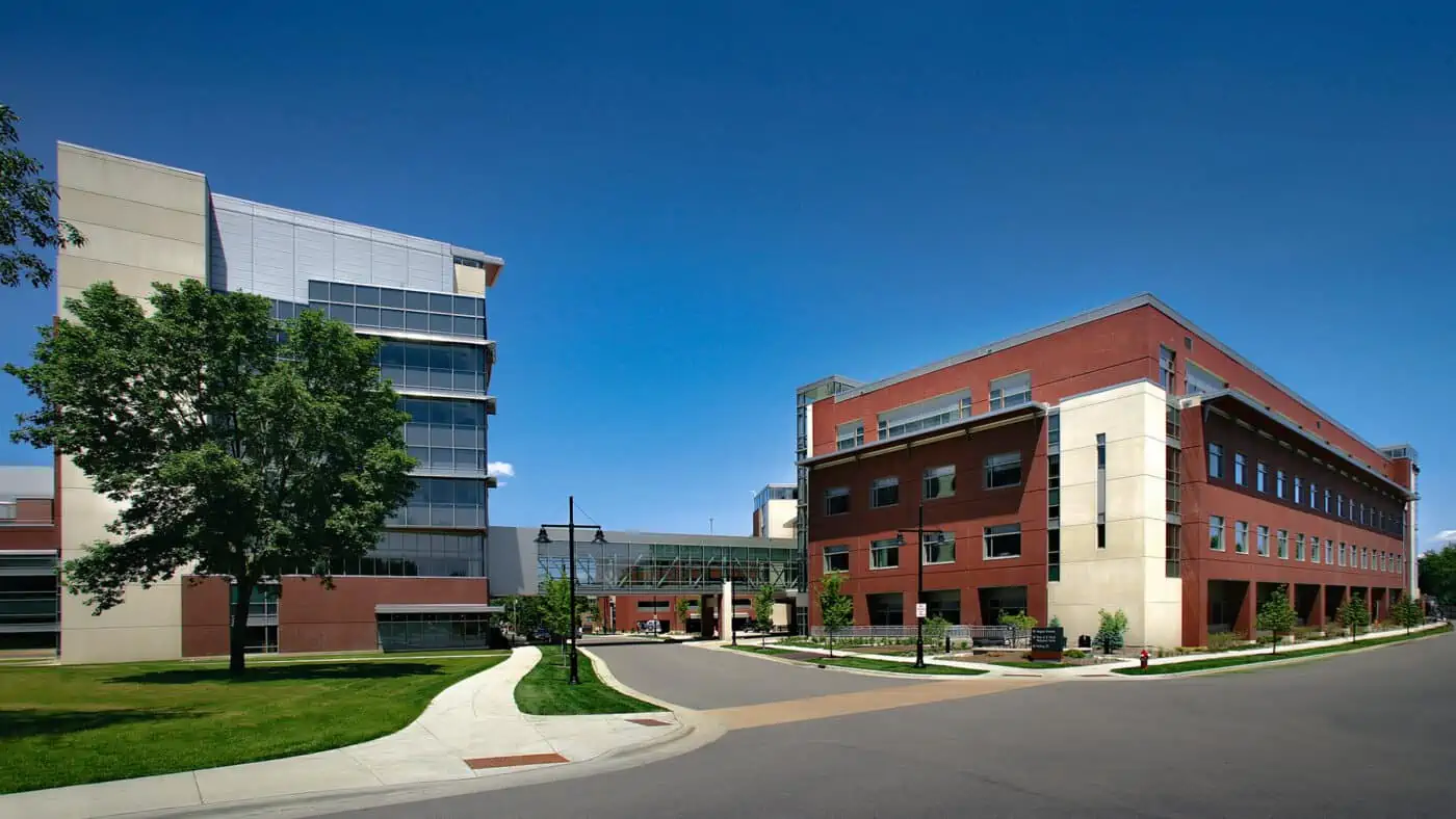 SSM Health - St. Mary's Hospital Campus with Skyway Connecting Two Buildings Visible above Street