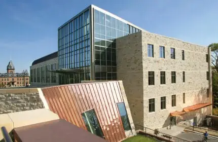 St. Olaf College - Regents Hall - Building Exterior with Copper Face and Campus in Background