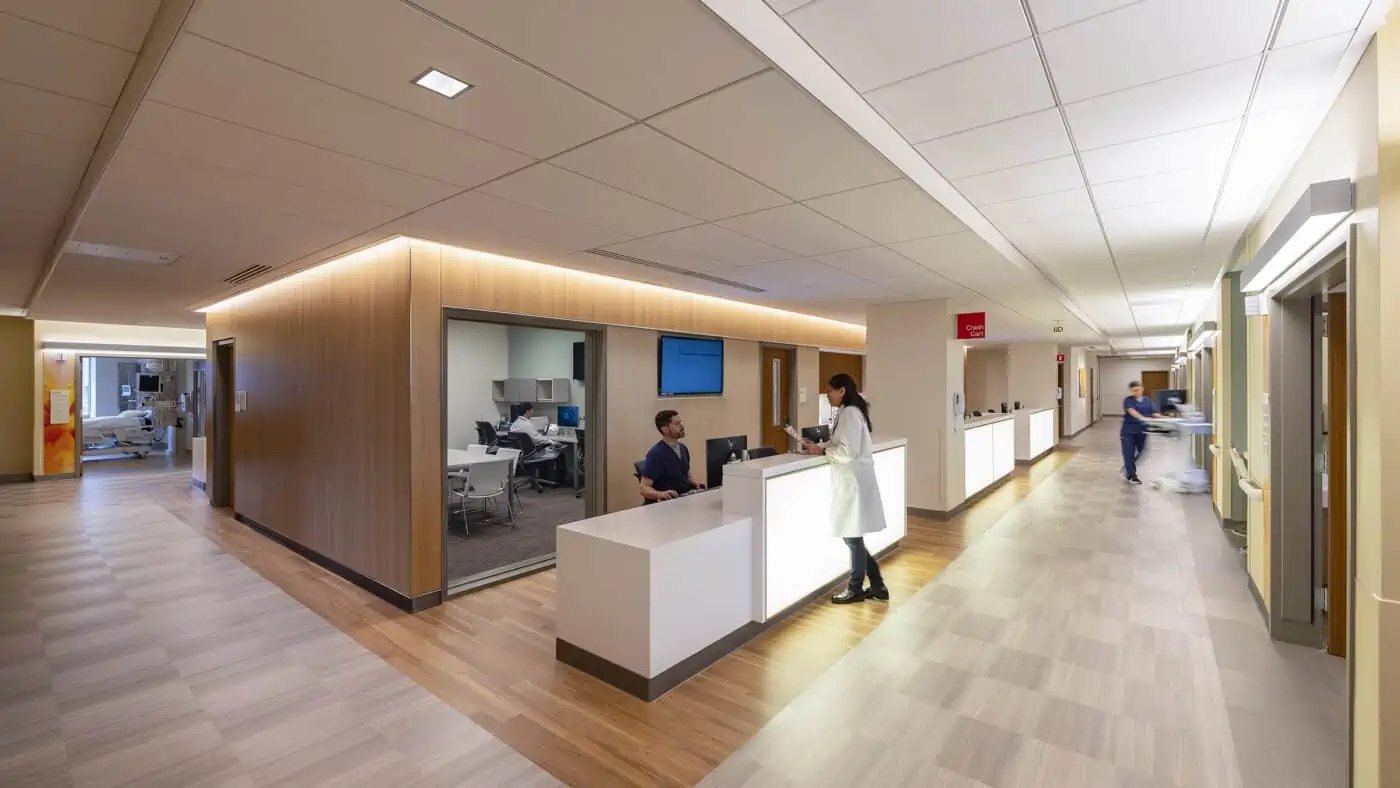 Sutter Health - CPMC Van Ness Campus Hospital with Floor Desk, Corridor and Medical Staff at Work