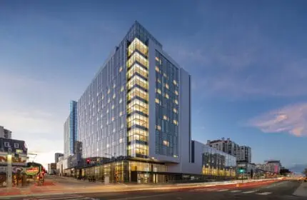 Sutter Health CPMC Van Ness Campus Hospital Exterior View of Building, Lit at Dusk