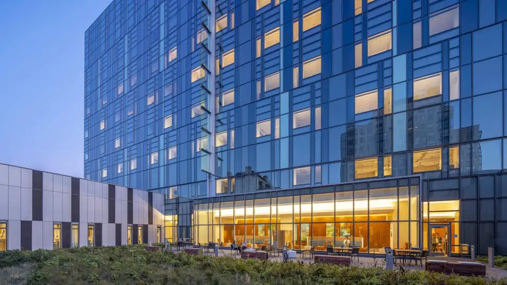 Sutter Health CPMC Van Ness Campus Hospital Exterior Lit at Night, Showing Exterior Courtyard Seating