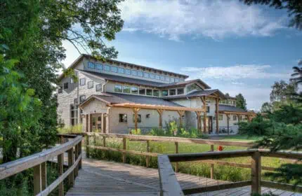 The Ridges Sanctuary - Center for Environmental Stewardship Exterior View of Building from Boardwalk