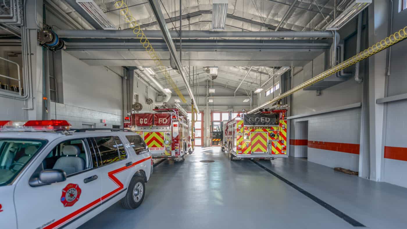 Town of Grand Chute - Fire Station #2 Interior View of Truck Bays with View Outside through Overhead Doors