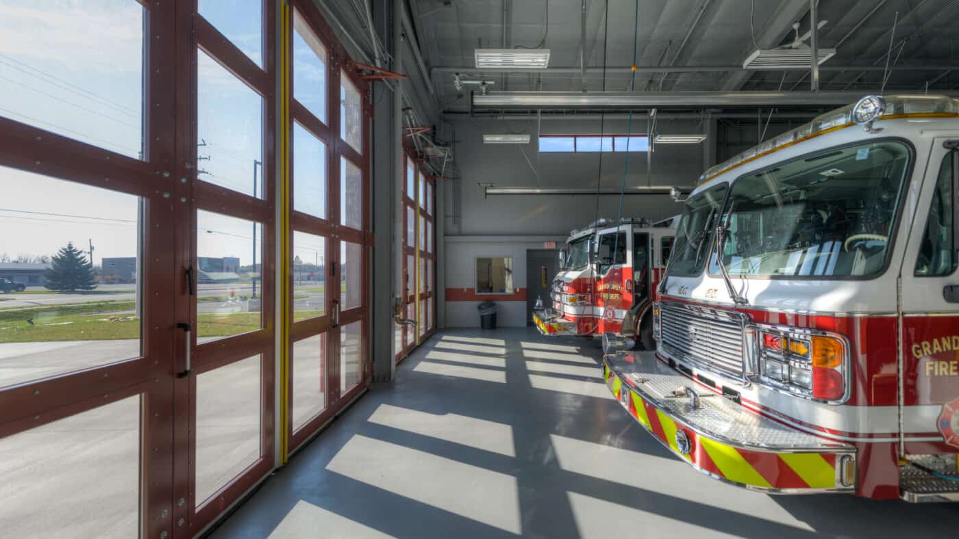 Town of Grand Chute - Fire Station #2 Interior View of Firetrucks, Outside View through Overhead Doors