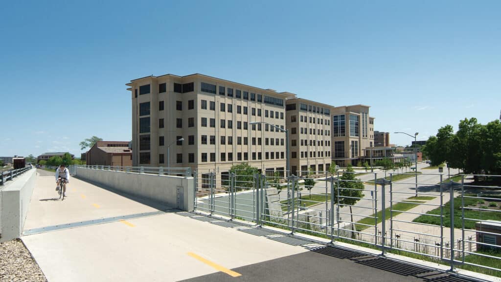 University of Wisconsin - Madison - Newell Smith Residence Hall Exterior View of Building from Bike Path, with Street Below Visible