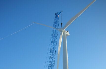 WE Energies - Wind Turbine Erection - Crane Lifts Blades onto Tower