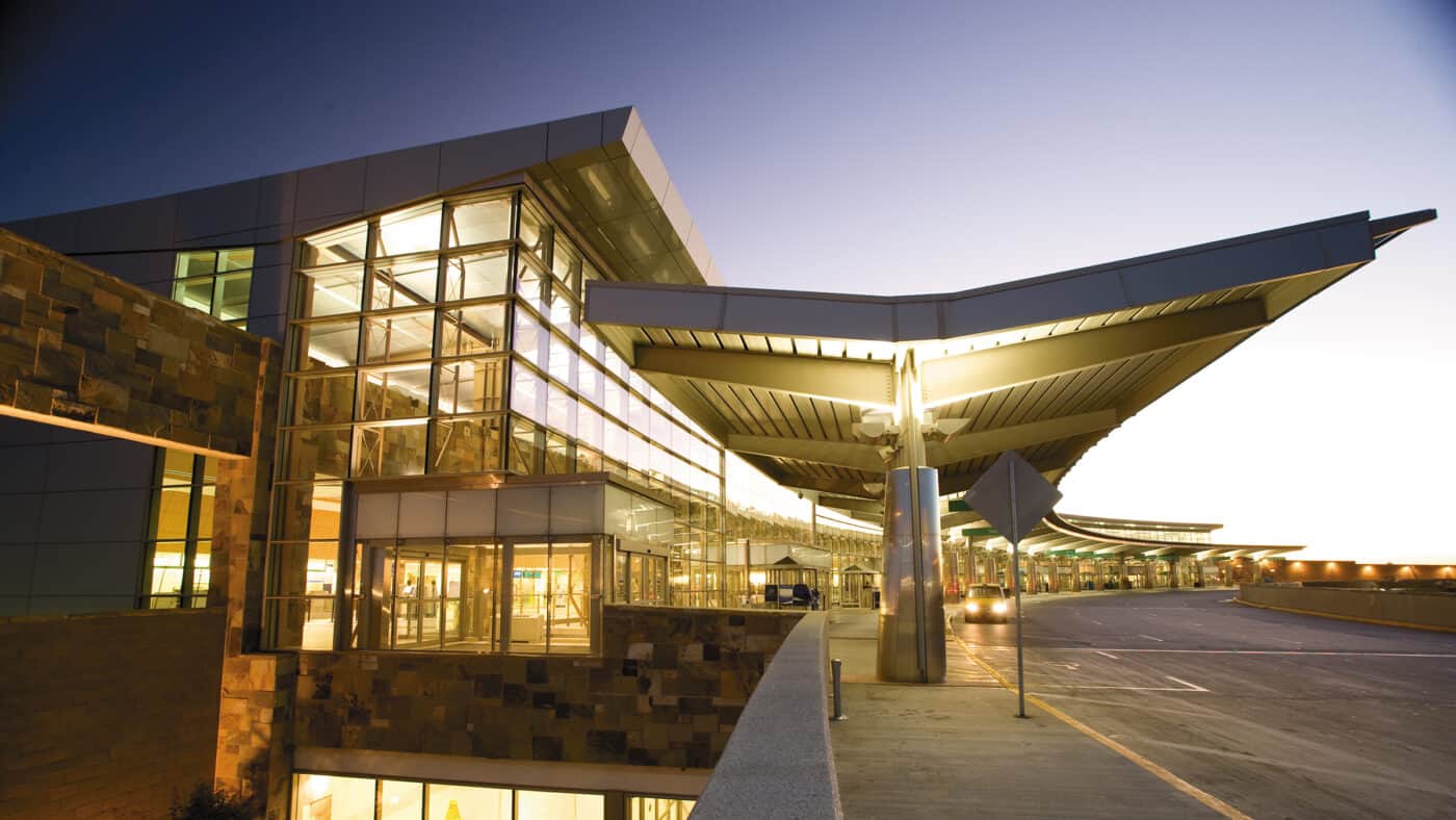 Will Rogers World Airport Building Exterior and Passenger Drop-off at Dusk