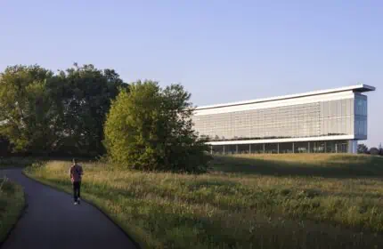 Ascendium corporate office, a lean construction hero - exterior view of building entrance and glass wall
